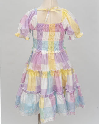 Pastel rainbow-colored dress with floral lace trim